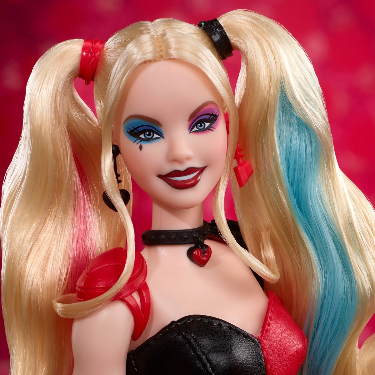 Harley Quinn Barbie doll face close up.
