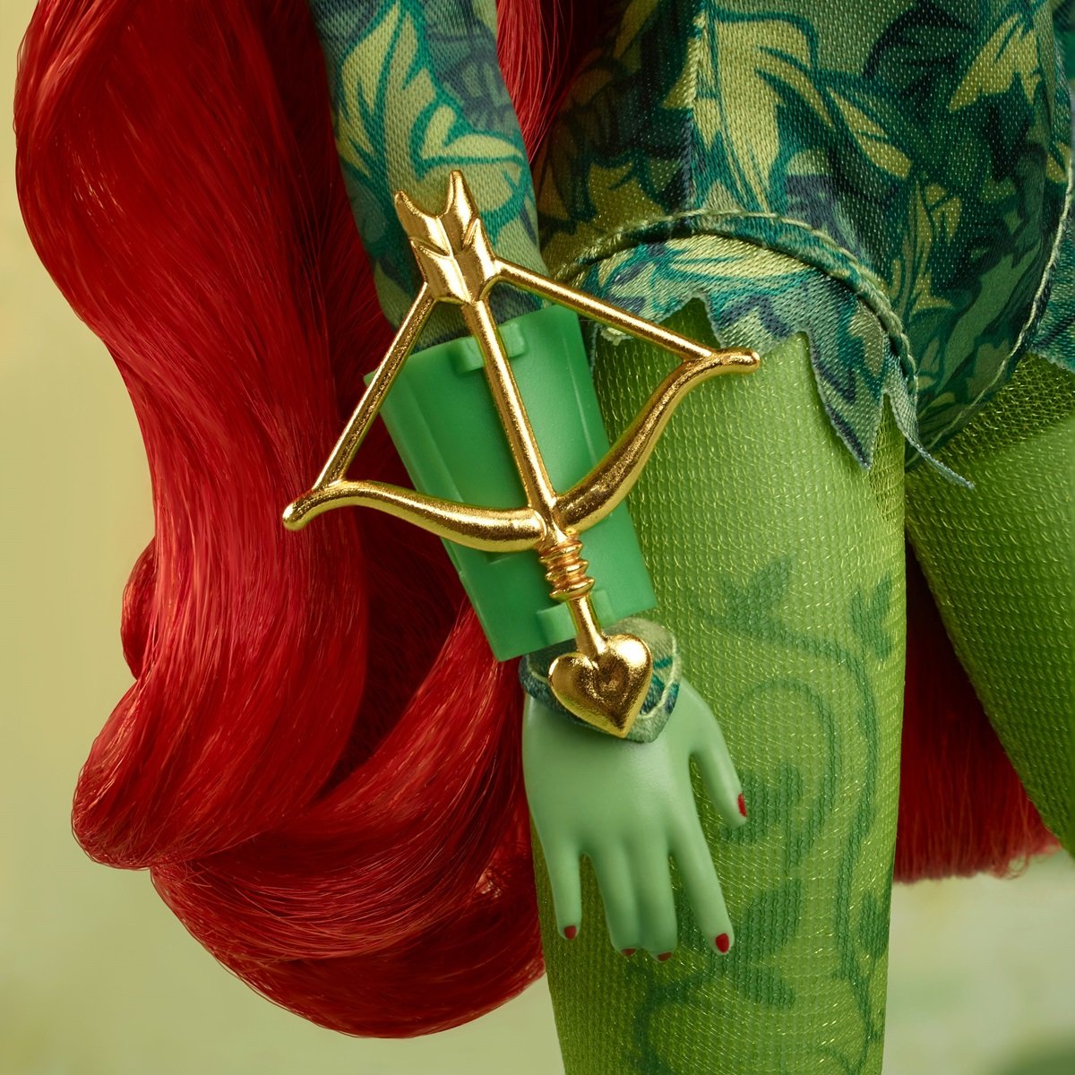 Barbie Poison Ivy doll hand crossbow detail.