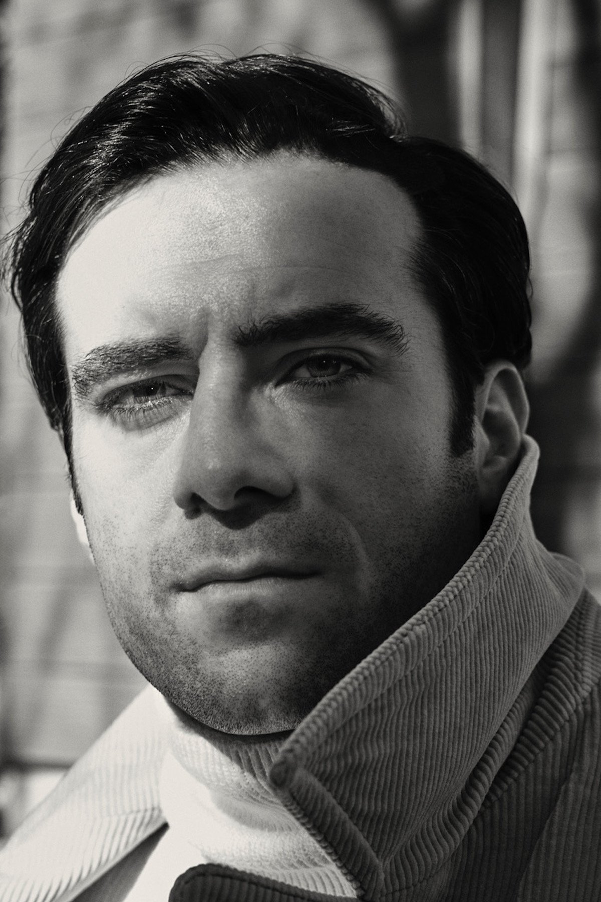 A black-and-white headshot of actor Cillian O'Sullivan