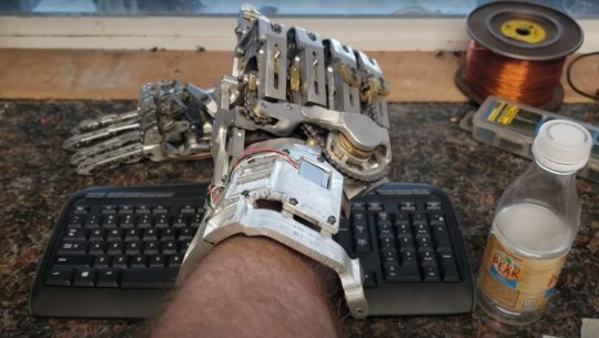Mechanical Hand Prosthetic Blends Steampunk with Cyberpunk