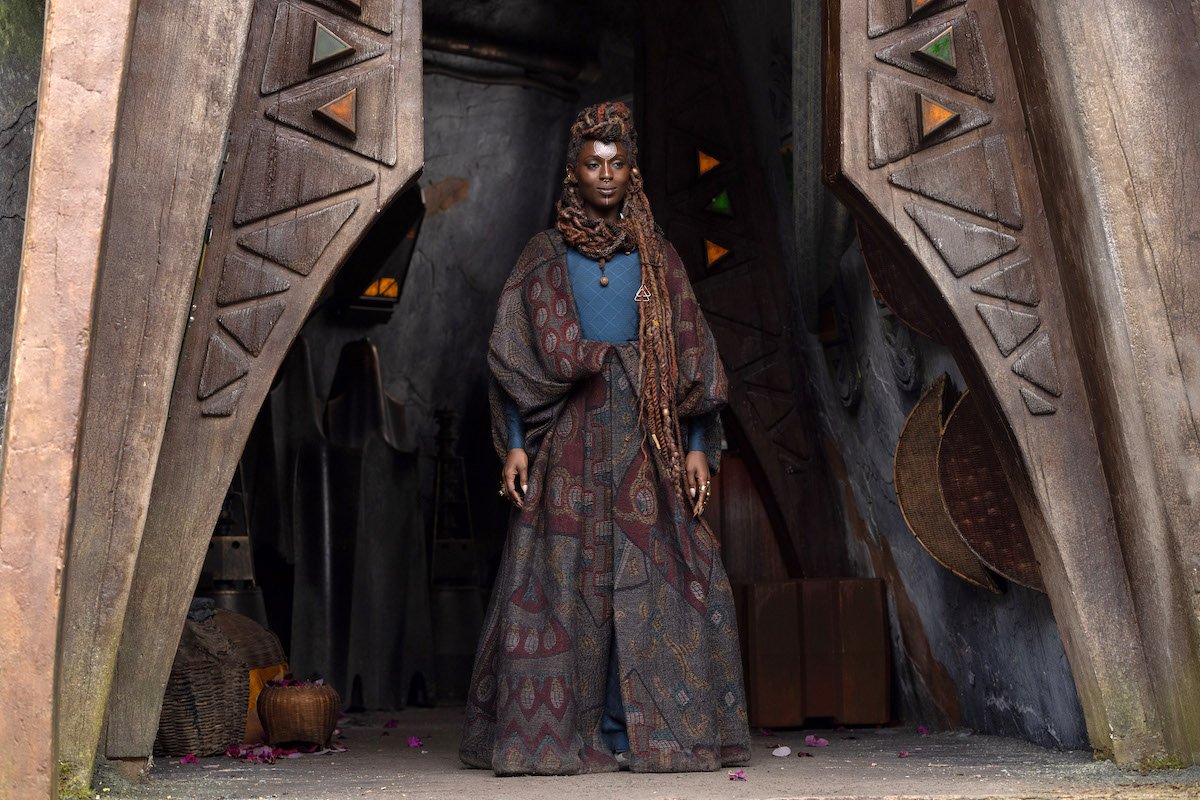 Mother Aniseya stands in her robes in a doorway on The Acolyte