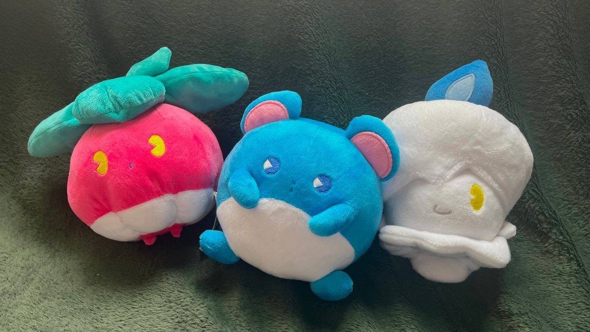 pokemon soda pop plush trio on couch