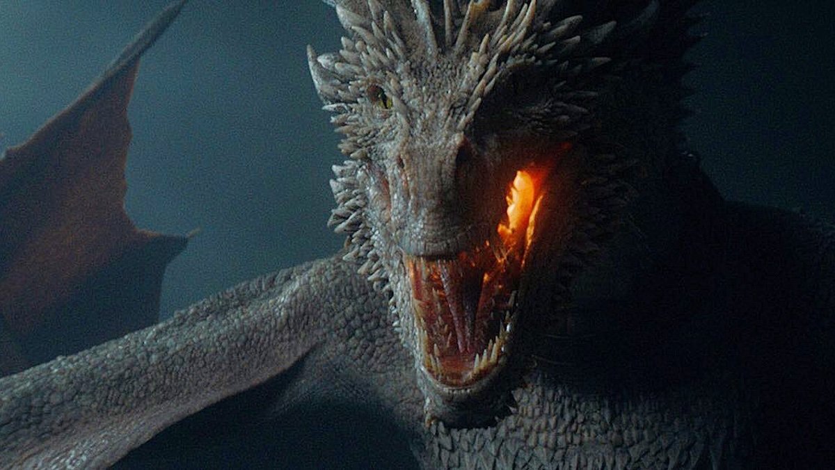 A roaring dragon with fire amassing in its throat on House of the Dragon